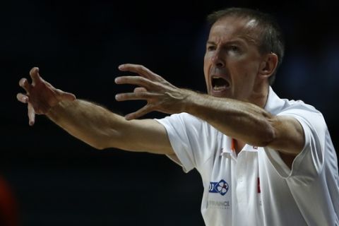 France's coach Vincent Collet reacts to his players during the 3rd place final of the World Basketball between France and Lithuania at the Palacio de los Deportes stadium in Madrid, Spain, Saturday, Sept. 13, 2014. (AP Photo/Andres Kudacki)