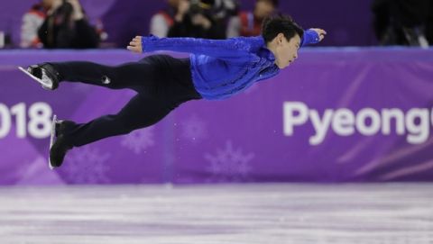 Denis Ten of Kazakhstan performs during the men's short program figure skating in the Gangneung Ice Arena at the 2018 Winter Olympics in Gangneung, South Korea, Friday, Feb. 16, 2018. (AP Photo/David J. Phillip)
