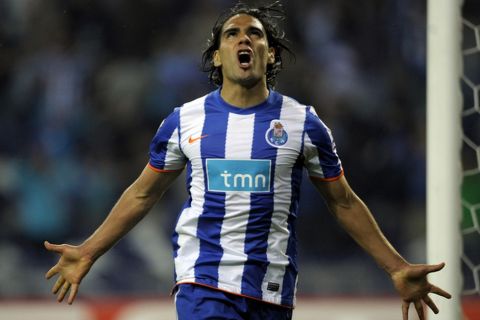 FC Porto´s forward Radamel Falcao from Colombia celebrates after scoring during their UEFA Europa League semi-finals first leg football match against Villareal at the Dragao Stadium in Porto, on April 28, 2011. AFP PHOTO / MIGUEL RIOPA (Photo credit should read MIGUEL RIOPA/AFP/Getty Images)
