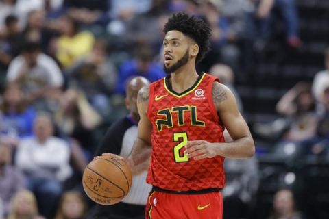 Atlanta Hawks guard Tyler Dorsey (2) plays against the Indiana Pacers during the second half of an NBA basketball game in Indianapolis, Friday, Feb. 23, 2018. The Pacers defeated the Hawks 116-93. (AP Photo/Michael Conroy)