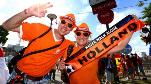SALVADOR, BRAZIL - JUNE 13:  Netherlands Fans enjoy the atmosphere prior to the 2014 FIFA World Cup Brazil Group B match between Spain and Netherlands at Arena Fonte Nova on June 13, 2014 in Salvador, Brazil.  (Photo by Quinn Rooney/Getty Images)