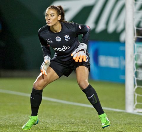 FILE - In this Oct. 1, 2015, file photo, Seattle Reign FC goalkeeper Hope Solo follows the action during the second half of the NWSL soccer championship match in Portland, Ore. Hope Solo says she hopes that someday she can return to the U.S. women's national team, but in the meantime she vows to keep fighting for equal pay for the players, Thursday, Dec. 22, 2016. (AP Photo/Craig Mitchelldyer, File)