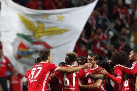 Benfica's players celebrated the second goal against Lyon during the Champions League group G soccer match between Benfica and Olympique Lyonnais at the Luz stadium in Lisbon, Wednesday, Oct. 23, 2019. (AP Photo/Armando Franca)