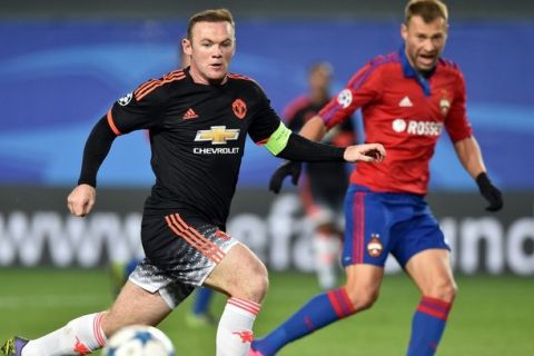 Manchester United's English forward Wayne Rooney eyes the ball during the UEFA Champions League group B football match between PFC CSKA Moscow and FC Manchester United at the Arena Khimki stadium outside Moscow on October 21, 2015. AFP PHOTO / KIRILL KUDRYAVTSEV        (Photo credit should read KIRILL KUDRYAVTSEV/AFP/Getty Images)