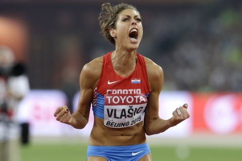 Croatia's Blanka Vlasic reacts after a jump in the women's high jump final at the World Athletics Championships at the Bird's Nest stadium in Beijing, Saturday, Aug. 29, 2015. (AP Photo/Kin Cheung) 