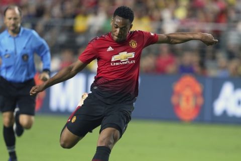 Manchester United forward Anthony Martial prepares to take a shot against Club America during the first half of a friendly soccer match at University of Phoenix Stadium, Thursday, July 19, 2018, in Glendale, Ariz. (AP Photo/Ralph Freso)