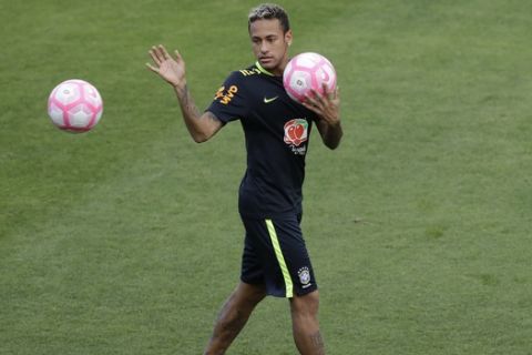 Brazil's Neymar attends a training session in preparation for an upcoming World Cup qualifying match, in Sao Paulo, Brazil, Friday, Oct. 6, 2017.  (AP Photo/Andre Penner)