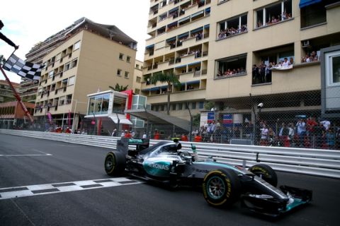 MONTE-CARLO, MONACO - MAY 24:  Nico Rosberg of Germany and Mercedes GP crosses the finish line to win the Monaco Formula One Grand Prix at Circuit de Monaco on May 24, 2015 in Monte-Carlo, Monaco.  (Photo by Dan Istitene/Getty Images)