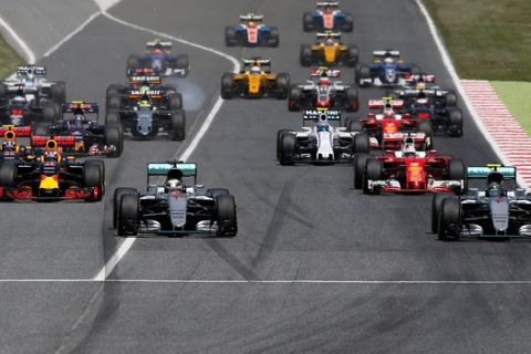 Mercedes drivers Lewis Hamilton of Britain, foreground center, and Nico Rosberg of Germany, right, lead at the start of the Spanish Formula One Grand Prix at the Barcelona Catalunya racetrack in Montmelo, just outside Barcelona, Spain, Sunday, May 15, 2016. (AP Photo/Manu Fernandez)