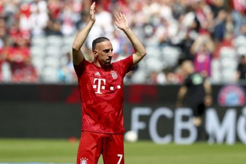 Bayern's Franck Ribery applaudes prior to the German Bundesliga soccer match between FC Bayern Munich and Eintracht Frankfurt in Munich, Germany, Saturday, May 18, 2019. (AP Photo/Matthias Schrader)