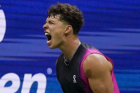 Ben Shelton, of the United States, reacts during a match against Frances Tiafoe, of the United States, during the quarterfinals of the U.S. Open tennis championships, Wednesday, Sept. 6, 2023, in New York. (AP Photo/Charles Krupa)