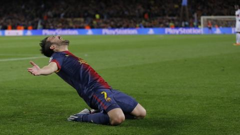 Barcelona's forward David Villa reacts after scoring his side's third goal during the Champions League round of 16 second leg soccer match between FC Barcelona and AC Milan at Camp Nou stadium, in Barcelona, Spain, Tuesday, March 12, 2013. (AP Photo/Daniel Ochoa de Olza)