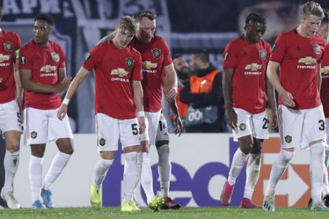Manchester players celebrate their side's first goal during the Europa League group L soccer match between Partizan Belgrade and Manchester United at the Partizan stadium in Belgrade, Serbia, Thursday, Oct. 24, 2019. (AP Photo/Darko Vojinovic)