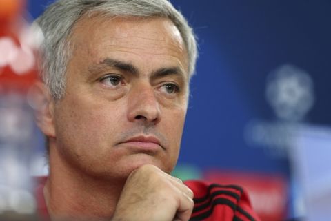 Manchester United coach Jose Mourinho listens to questions during a news conference at Benfica's Luz stadium in Lisbon, Tuesday, Oct. 17, 2017. Manchester United will face Benfica Wednesday in a Champions League group A soccer match. (AP Photo/Armando Franca)