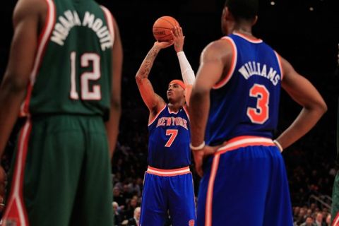 NEW YORK, NY - FEBRUARY 23:  Carmelo Anthony #7 of the New York Knicks shoot a free throw against  the Milwaukee Bucks at Madison Square Garden on February 23, 2011 in New York City. NOTE TO USER: User expressly acknowledges and agrees that, by downloading and/or using this Photograph, User is consenting to the terms and conditions of the Getty Images License Agreement.  (Photo by Chris Trotman/Getty Images)