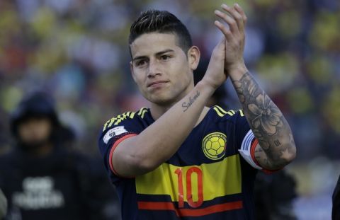 Colombia's James Rodriguez celebrates after his team beat Ecuador 2-0 during a 2018 World Cup qualifying soccer match at the Atahualpa Olympic Stadium in Quito, Ecuador, Tuesday, March 28, 2017. (AP Photo/Fernando Vergara)