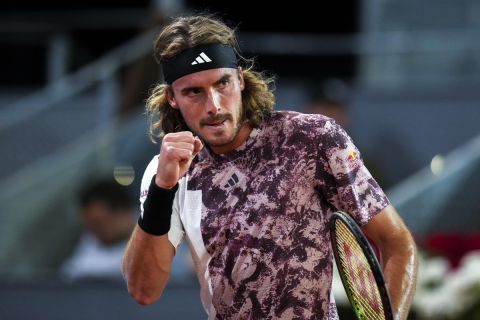 Greece's Stefanos Tsitsipas celebrates a point against Bernabe Zapata Miralles, of Spain, during their match at the Madrid Open tennis tournament in Madrid, Spain, Tuesday, May 2, 2023. (AP Photo/Manu Fernandez)