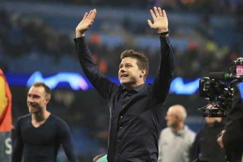 Tottenham coach Mauricio Pochettino waves to the fans during the Champions League quarterfinal, second leg, soccer match between Manchester City and Tottenham Hotspur at the Etihad Stadium in Manchester, England, Wednesday, April 17, 2019. (AP Photo/Jon Super)