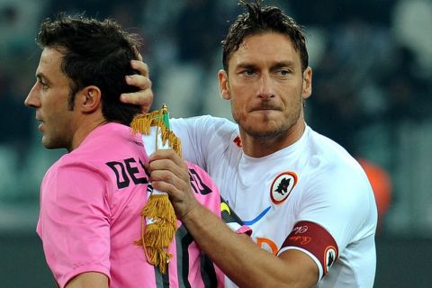 TURIN, ITALY - JANUARY 24:  Francesco Totti (R) of AS Roma salutes Alessandro Del Piero of Juventus FC prior to the Tim Cup match between Juventus FC and AS Roma at Juventus Arena on January 24, 2012 in Turin, Italy.  (Photo by Valerio Pennicino/Getty Images)