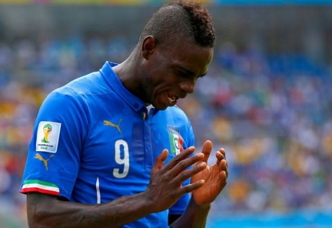 NATAL, BRAZIL - JUNE 24:  Mario Balotelli of Italy reacts during the 2014 FIFA World Cup Brazil Group D match between Italy and Uruguay at Estadio das Dunas on June 24, 2014 in Natal, Brazil.  (Photo by Clive Rose/Getty Images)