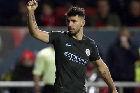 Manchester City's Sergio Aguero celebrates scoring his side's second goal of the game during the English League Cup semi final, second leg match against Bristol City at Ashton Gate, Bristol, England, Tuesday, Jan. 23, 2018. (Nick Potts/PA via AP)