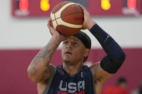 Paolo Banchero of the Orlando Magic shoots during training camp for the United States men's basketball team Friday, Aug. 4, 2023, in Las Vegas. (AP Photo/John Locher)
