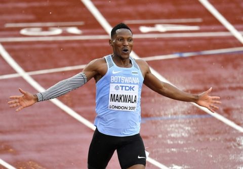 Botswana's Isaac Makwala celebrates after a men's 200-meter individual time trial during the World Athletics Championships in London Wednesday, Aug. 9, 2017. Makwala ran to qualify for the 200m semi-finals after he missed the 200m heats and the 400m final as he was barred from competing for 48 hours while organizers tried to halt a norovirus outbreak. (AP Photo/Martin Meissner)
