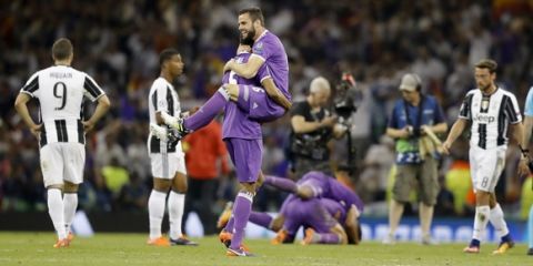 Real Madrid's Nacho celebrates at the final whistle after the Champions League final soccer match between Juventus and Real Madrid at the Millennium stadium in Cardiff, Wales Saturday June 3, 2017. Real won the match 4-1. (AP Photo/Frank Augstein)