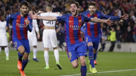 Barcelona's Sergi Roberto celebrates after scoring the sixth goal during the Champions League round of 16, second leg soccer match between FC Barcelona and Paris Saint Germain at the Camp Nou stadium in Barcelona, Spain, Wednesday March 8, 2017. Barcelona won 6-1. (AP Photo/Emilio Morenatti)