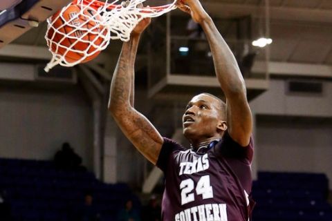 Dec 29, 2013; Fort Worth, TX, USA; Texas Southern Tigers center Aaric Murray (24) dunks during the game against the TCU Horned Frogs at Daniel-Meyer Coliseum. TCU won 77-64. Mandatory Credit: Kevin Jairaj-USA TODAY Sports