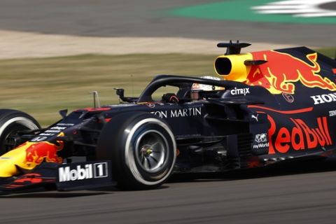 Red Bull driver Max Verstappen of the Netherlands steers his car during the 70th Anniversary Formula One Grand Prix at the Silverstone circuit, Silverstone, England, Sunday, Aug. 9, 2020. (Andrew Boyers, Pool via AP)