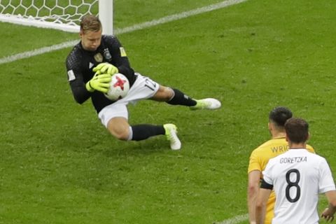 Germany goalkeeper Bernd Leno drops the ball before Australia scored their second goal during the Confederations Cup, Group B soccer match between Australia and Germany, at the Fisht Stadium in Sochi, Russia, Monday, June 19, 2017. (AP Photo/Sergei Grits)