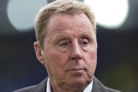 Harry Redknapp as a television pundit before the English Premier League soccer match between Everton and Chelsea at Goodison Park Stadium, Liverpool, England, Saturday Sept. 12, 2015. (AP Photo/Jon Super)  