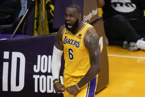 Los Angeles Lakers' LeBron James (6) reacts after making a basket against the Memphis Grizzlies in overtime in Game 4 of a first-round NBA basketball playoff series Monday, April 24, 2023, in Los Angeles. The Lakers won 117-111. (AP Photo/Jae C. Hong)