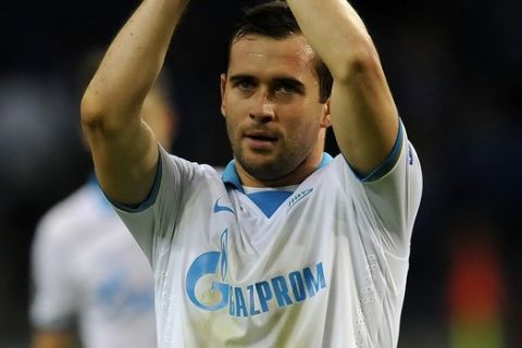 Zenit's Aleksandr Kerzhakov celebrates their 1-0 victory over Porto during the Champions League group G soccer match between FC Porto and Zenit Tuesday, Oct. 22, 2013, at the Dragao stadium in Porto, northern Portugal. Kerzhakov scored the only goal. (AP Photo/Paulo Duarte)