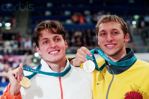 18 Sep 2000, Sydney, Australia --- Dutchman Pieter van den Hoogenband (L) shows off the gold medal he won in the men's 200-meter freestyle final with silver medalist Ian Thorpe from Australia at the 2000 Olympic Games in Sydney. --- Image by © Franck Seguin/TempSport/Corbis
