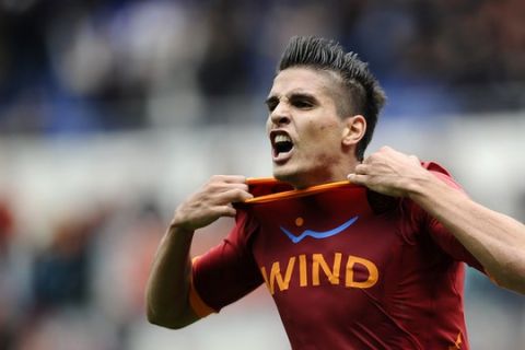 AS Roma's Argentine forward Erik Manuel Lamela celebrates after scoring against Novara on April 1, 2012 during a Serie A football match at Rome's Olympic stadium. AFP PHOTO / Filippo MONTEFORTE (Photo credit should read FILIPPO MONTEFORTE/AFP/Getty Images)