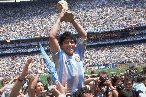 ** FILE ** In this June 29, 1986 file photo Diego Maradona of Argentina celebrates with the cup at the end of the World Cup soccer final in the Atzeca Stadium, in Mexico City, Mexico. A star who was addicted to drugs, sentenced to jail for shooting at reporters and punched the ball into the net in a World Cup quarterfinal doesn't seem like the ideal candidate to coach a national football team. But this is Diego Maradona, one of football's all-time greats who can do no wrong in the eyes of Argentina's fans. Maradona, who turns 48 on Thursday, and Carlos Bilardo have been asked to lead the national team by Julio Grondona, head of the Argentine Football Association. (AP Photo/Carlo Fumagalli, File)