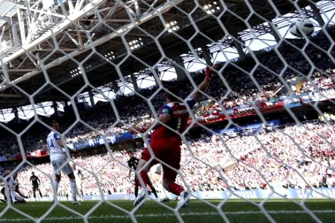 Argentina's Sergio Aguero scores the opening goal during the group D match between Argentina and Iceland at the 2018 soccer World Cup in the Spartak Stadium in Moscow, Russia, Saturday, June 16, 2018. (AP Photo/Matthias Schrader)