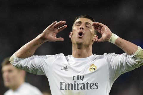 "Real Madrid's Portuguese forward Cristiano Ronaldo gestures during the Champions League quarter-final second leg football match Real Madrid vs Wolfsburg at the Santiago Bernabeu stadium in Madrid on April 12, 2016. / AFP / JAVIER SORIANO        (Photo credit should read JAVIER SORIANO/AFP/Getty Images)"