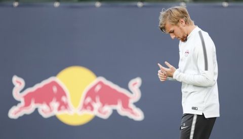 Leipzig's Emil Forsberg arrives at the final training session before the Champions League Group G soccer match between RB Leipzig and AS Monaco at the Red Bull Akademie in Leipzig, Germany, Tuesday, Sept. 12, 2017.  (Jan Woitas/dpa via AP)