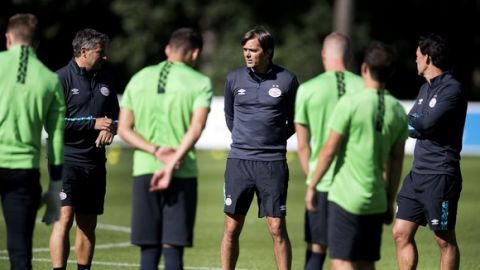PSV Eindhoven's coach Philip Cocu (C) attends a training session ahead of the Champions League match against Atletico Madrid in Eindhoven, The Netherlands, on September 12, 2016.   / AFP / ANP / Olaf Kraak / Netherlands OUT        (Photo credit should read OLAF KRAAK/AFP/Getty Images)
