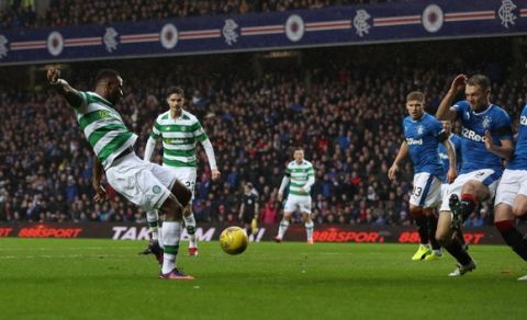 GLASGOW, SCOTLAND - DECEMBER 31:  Moussa Dembele of Celtic scores during the Rangers v Celtic Ladbrokes Scottish Premiership match at Ibrox Stadium on December 31, 2016 in Glasgow, Scotland. (Photo by Ian MacNicol/Getty Images)