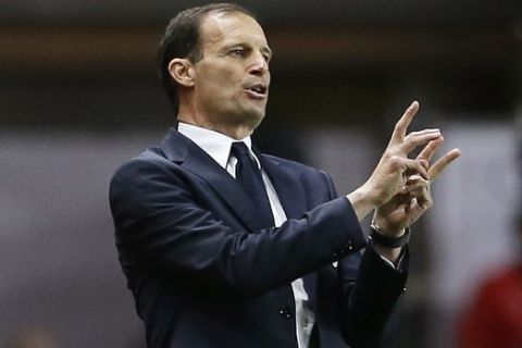 Juventus head coach Massimiliano Allegri gives instructions during the Champions League semifinal first leg soccer match between Monaco and Juventus at the Louis II stadium in Monaco, Wednesday, May 3, 2017. (AP Photo/Claude Paris)