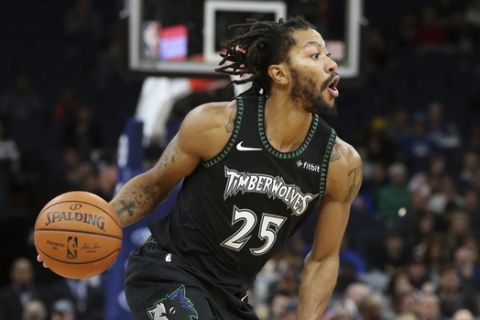 Minnesota Timberwolves' Derrick Rose plays against the Utah Jazz in the second half of an NBA basketball game against the Minnesota Timberwolves Wednesday, Oct. 31, 2018, in Minneapolis. (AP Photo/Jim Mone)