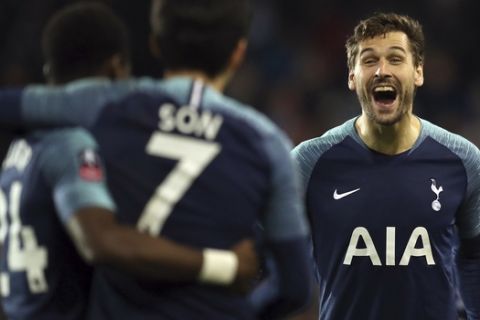 Tottenham's Fernando Llorente, right, celebrates after scoring his side's second goal during the English FA Cup third round soccer match between Tranmere Rovers and Tottenham Hotspur at Prenton Park stadium in Birkenhead, England, Friday, Jan. 4, 2019.(AP Photo/Jon Super)
