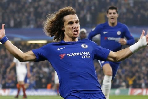 Chelsea's David Luiz celebrates after scoring during the Champions League group C soccer match between Chelsea and Roma at Stamford Bridge stadium in London, Wednesday, Oct. 18, 2017. (AP Photo/Frank Augstein)