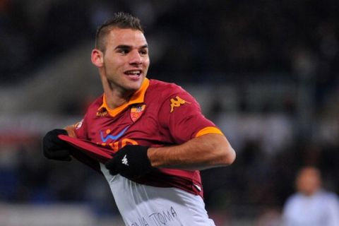AS Roma Greek midfielder Panagiotis Tachtsidis celebrates after scoring against Fiorentina during their Italian Serie A football match on December 8, 2012 at the Olympic stadium in Rome. AFP PHOTO / TIZIANA FABI        (Photo credit should read TIZIANA FABI/AFP/Getty Images)