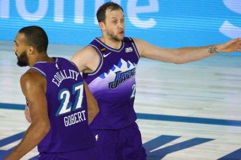Utah Jazz's Joe Ingles (2) reacts after scoring a three-pointer against the Memphis Grizzlies during the second half of an NBA basketball game Wednesday, Aug. 5, 2020, in Lake Buena Vista, Fla. (Kevin C. Cox/Pool Photo via AP)
