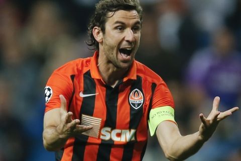 Shakhtar's Darijo Srna reacts after referee Babek grants a penalty for Real Madrid  during a Group A Champions League soccer match between Real Madrid and Shakhtar Donetsk at the Santiago Bernabeu stadium in Madrid, Spain, Tuesday, Sept. 15, 2015. (AP Photo/Paul White)
